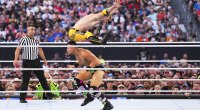 Logan Paul jumping over a WWE wrestler in the squared circle